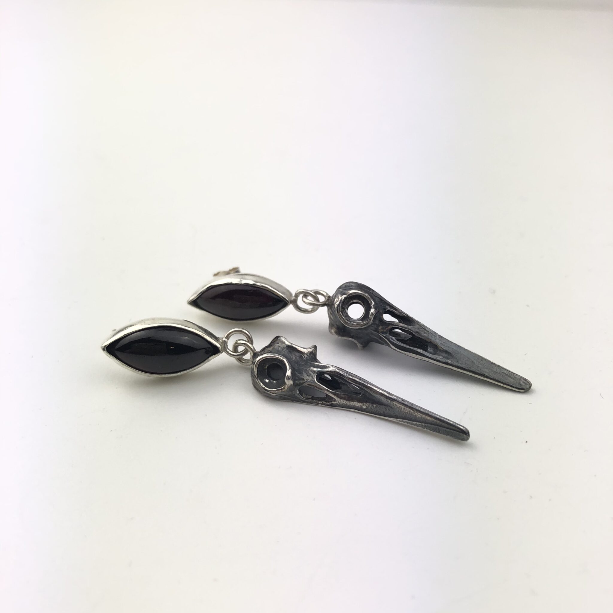 Skulls & garnet earrings