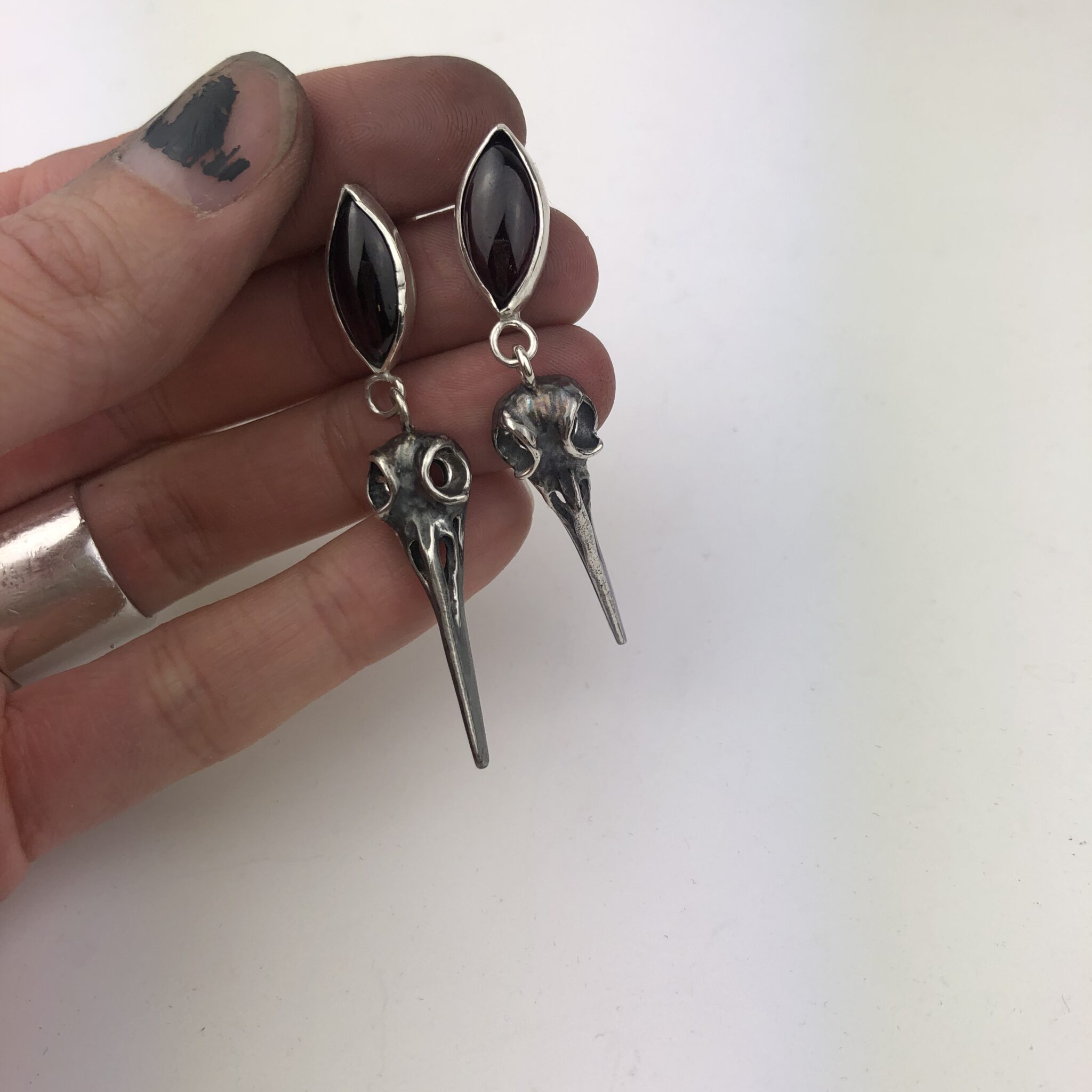 Skulls & garnet earrings