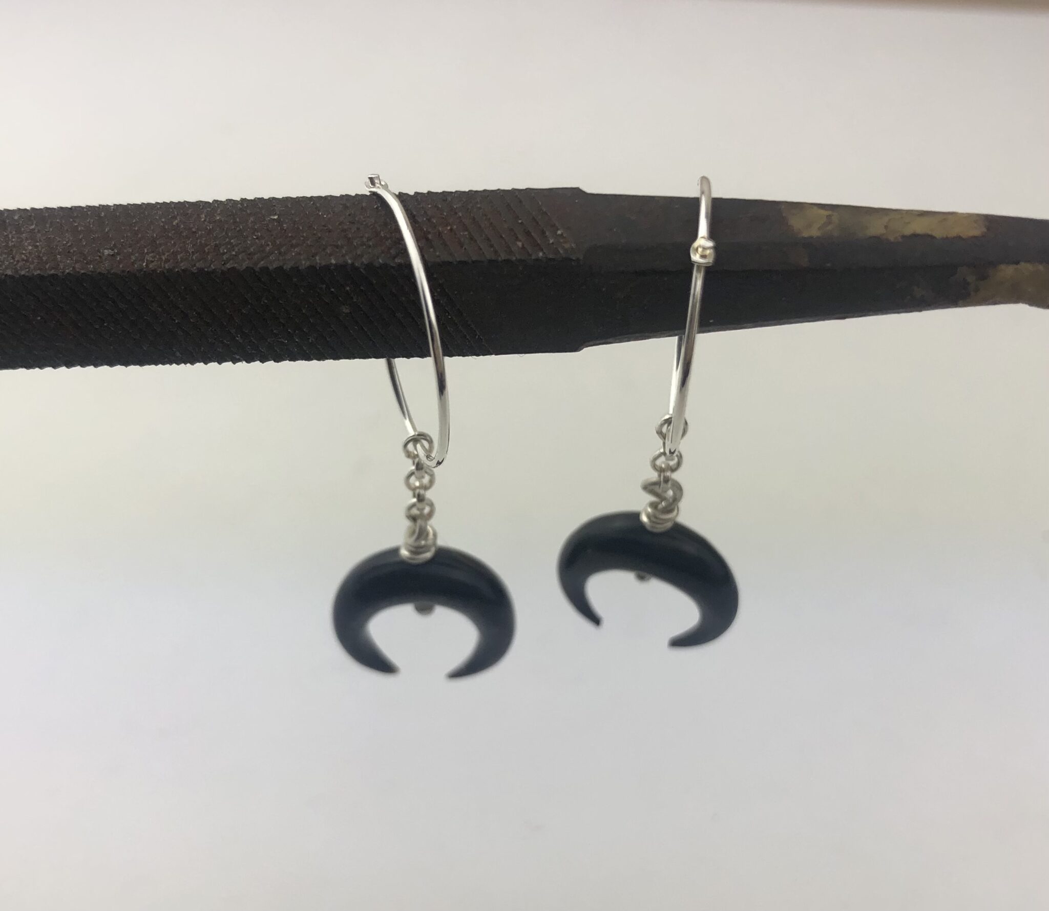 bull horn crescent moon earrings