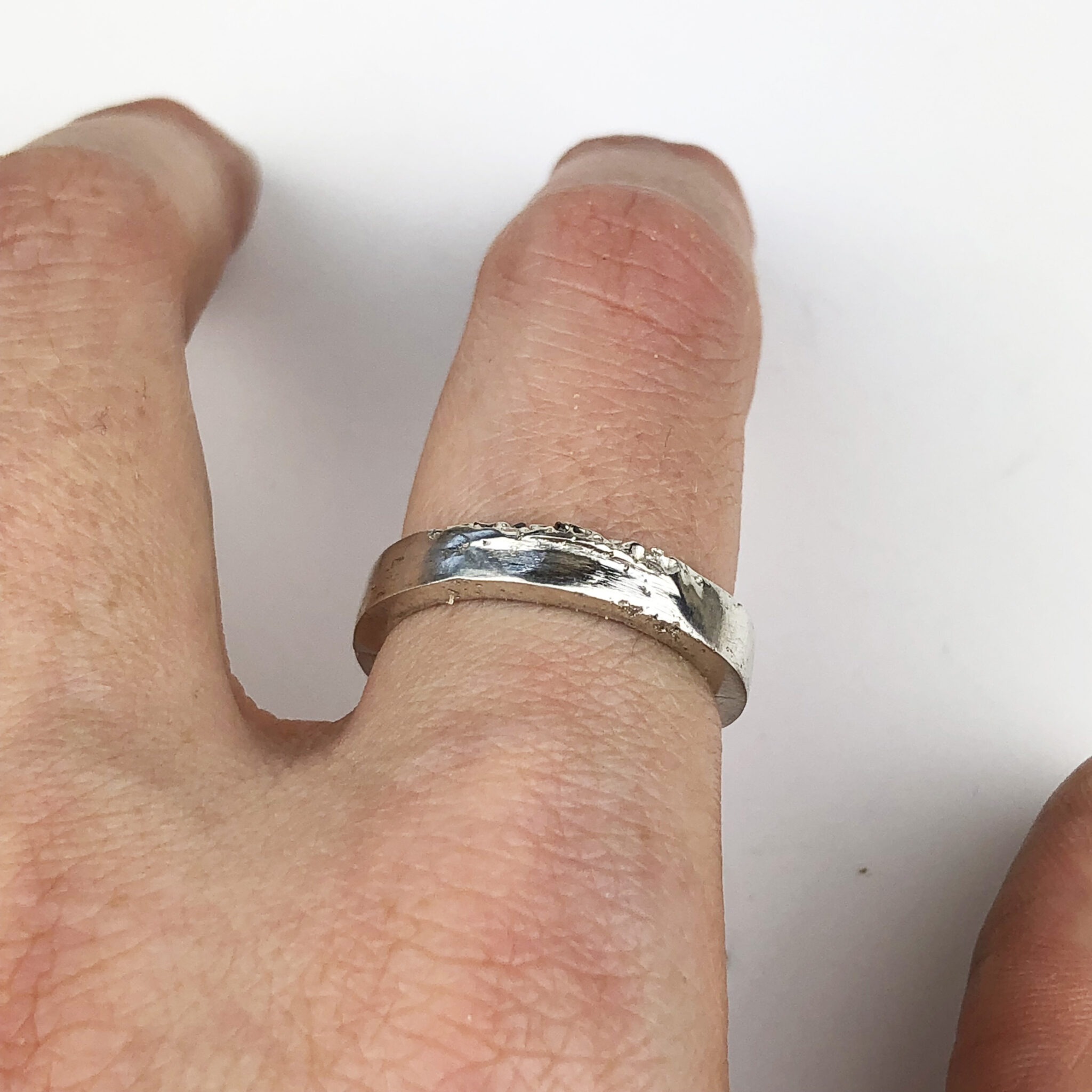 Cast in place silver Ring