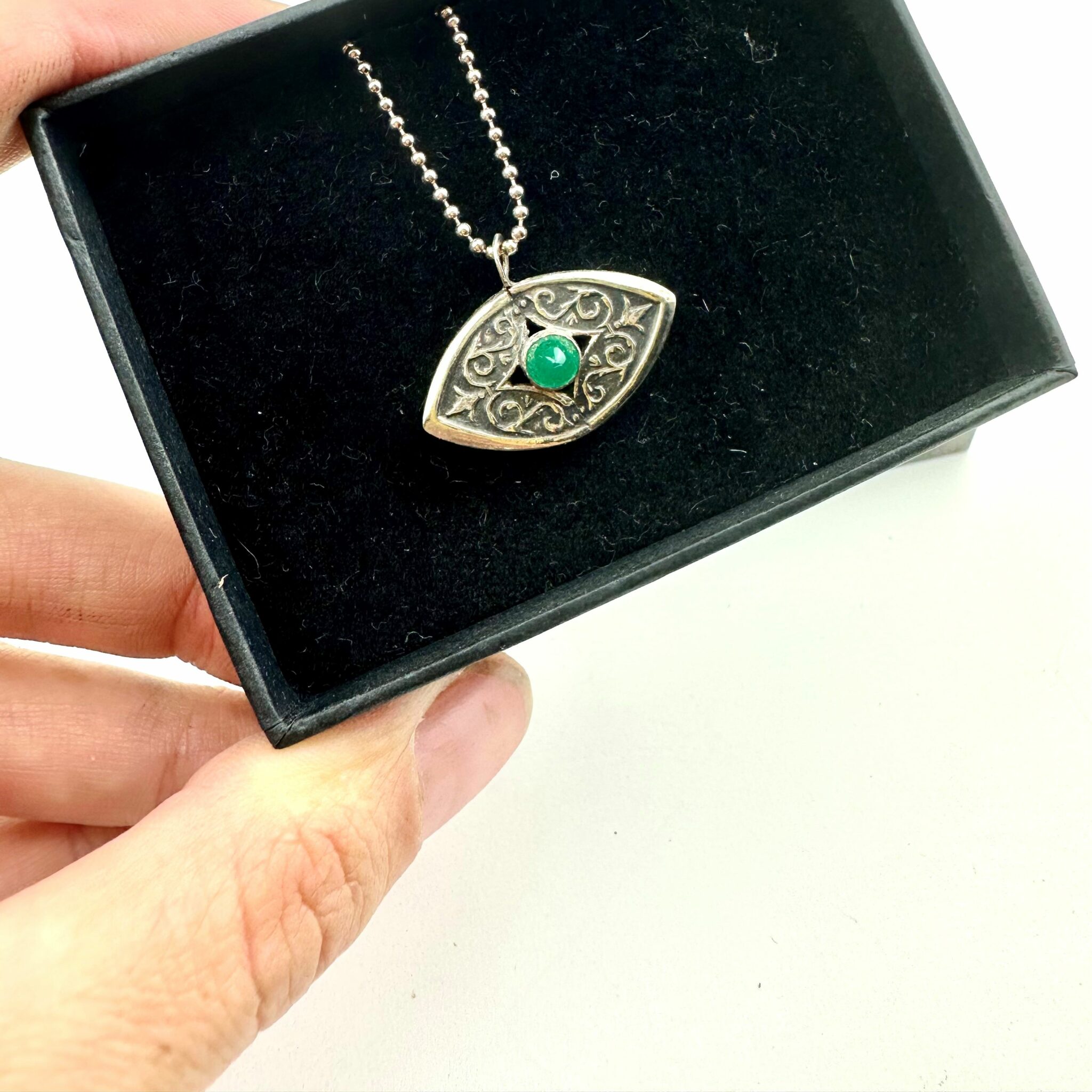 green onyx evil eye cutlery pendant