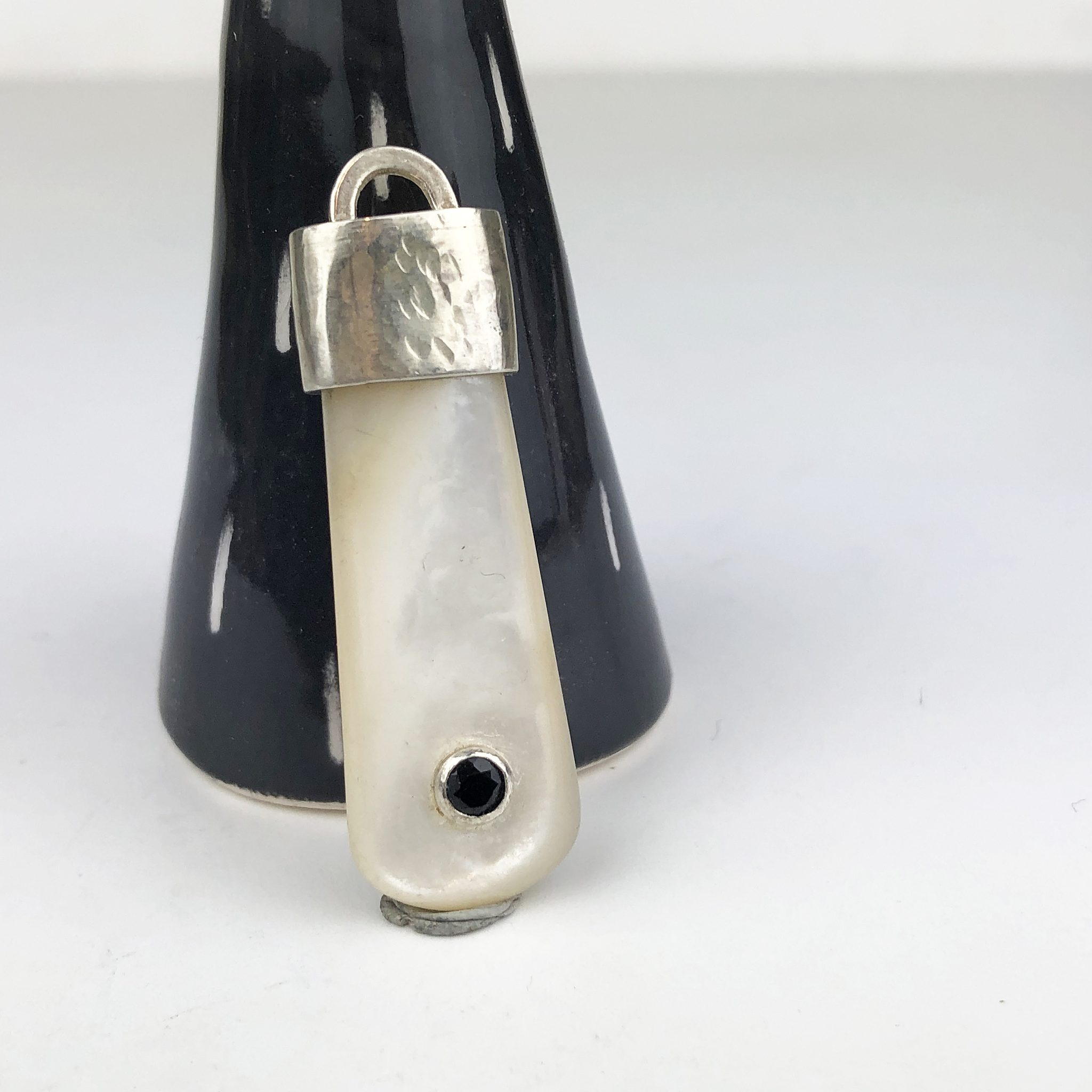 Mother of pearl, sterling silver and sapphire pendant