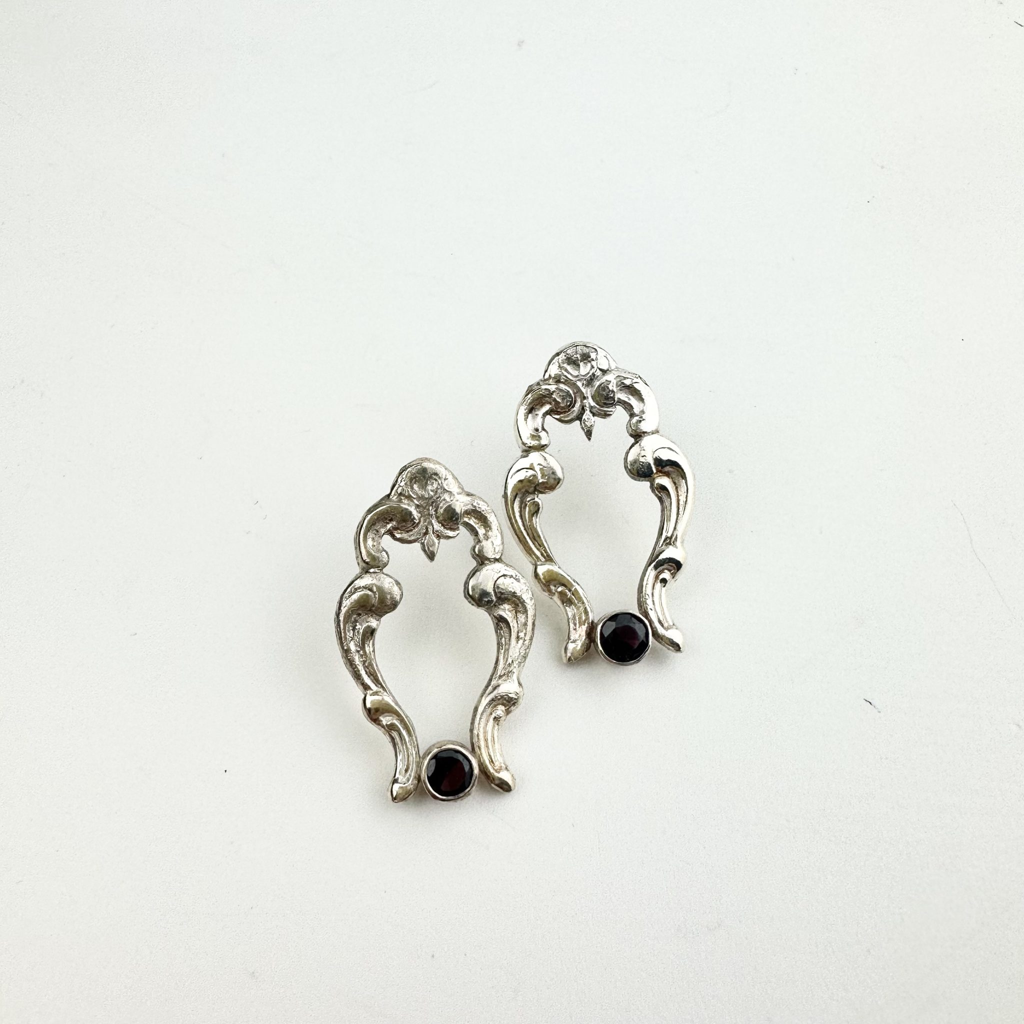 Open Garnet spoon earrings
