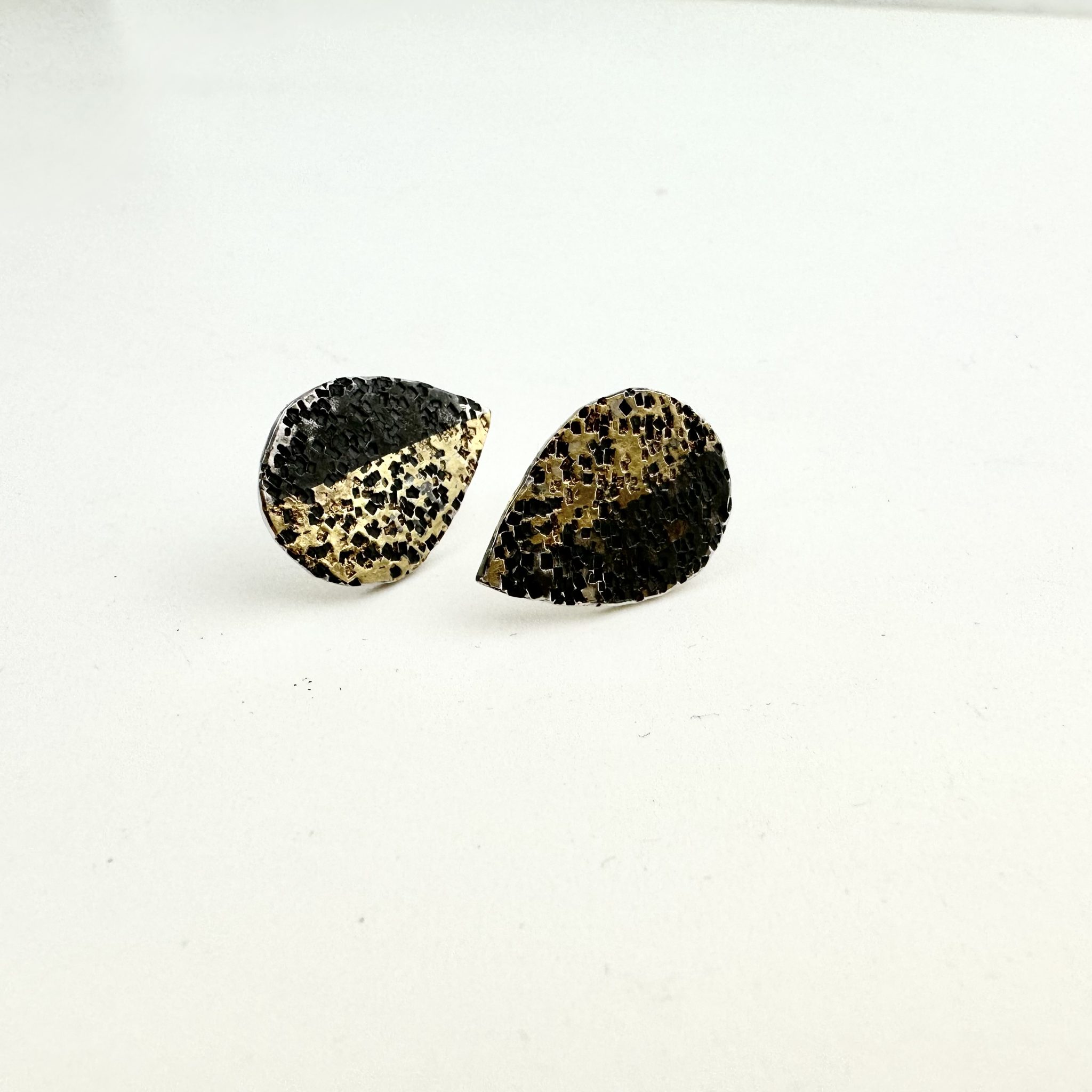 black and gold studs