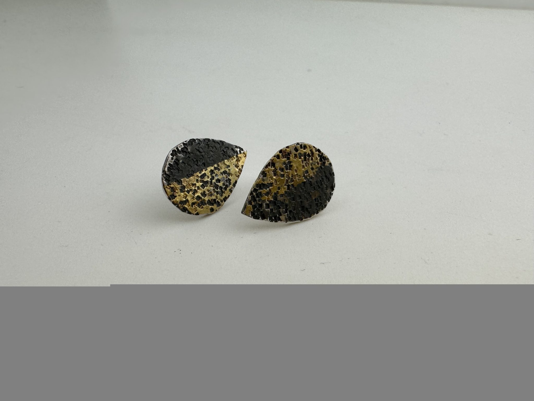 black and gold studs