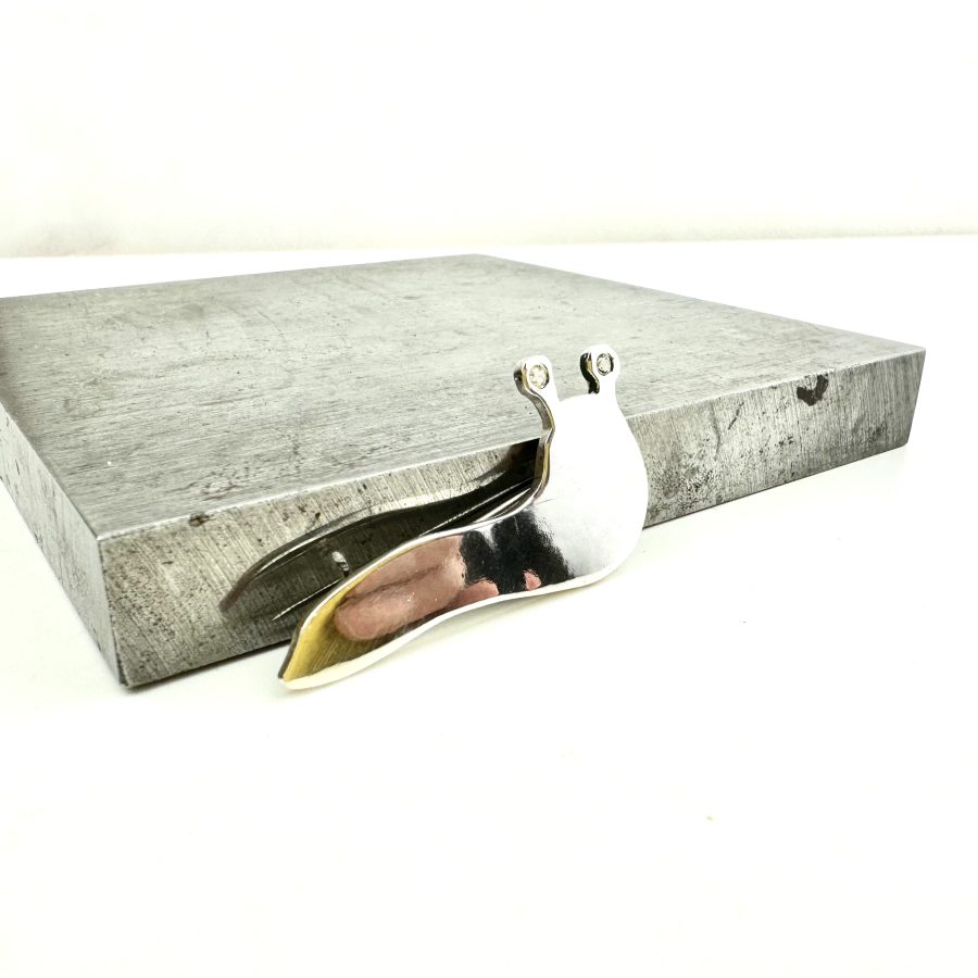slug brooch