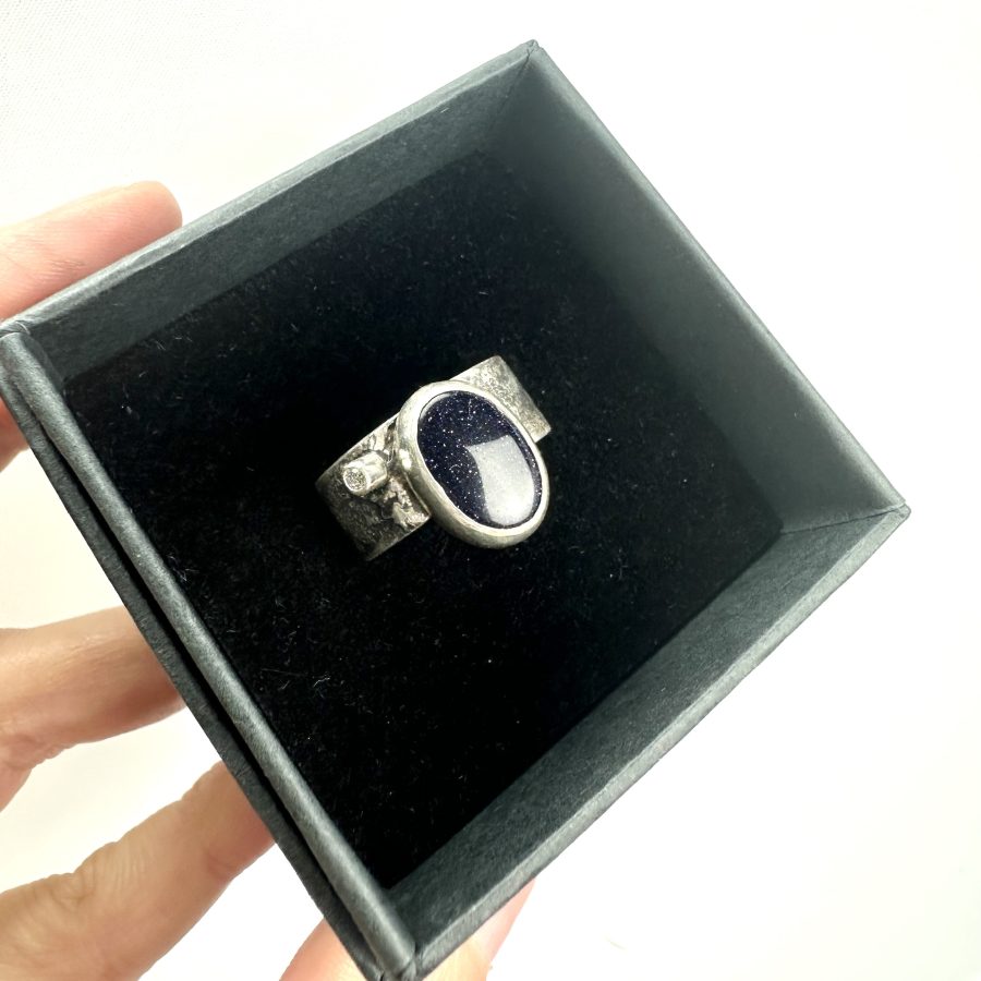Sterling silver reticulated blue goldstone ring