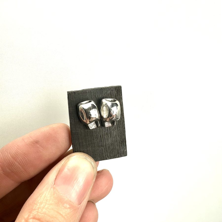 reverse skull studs