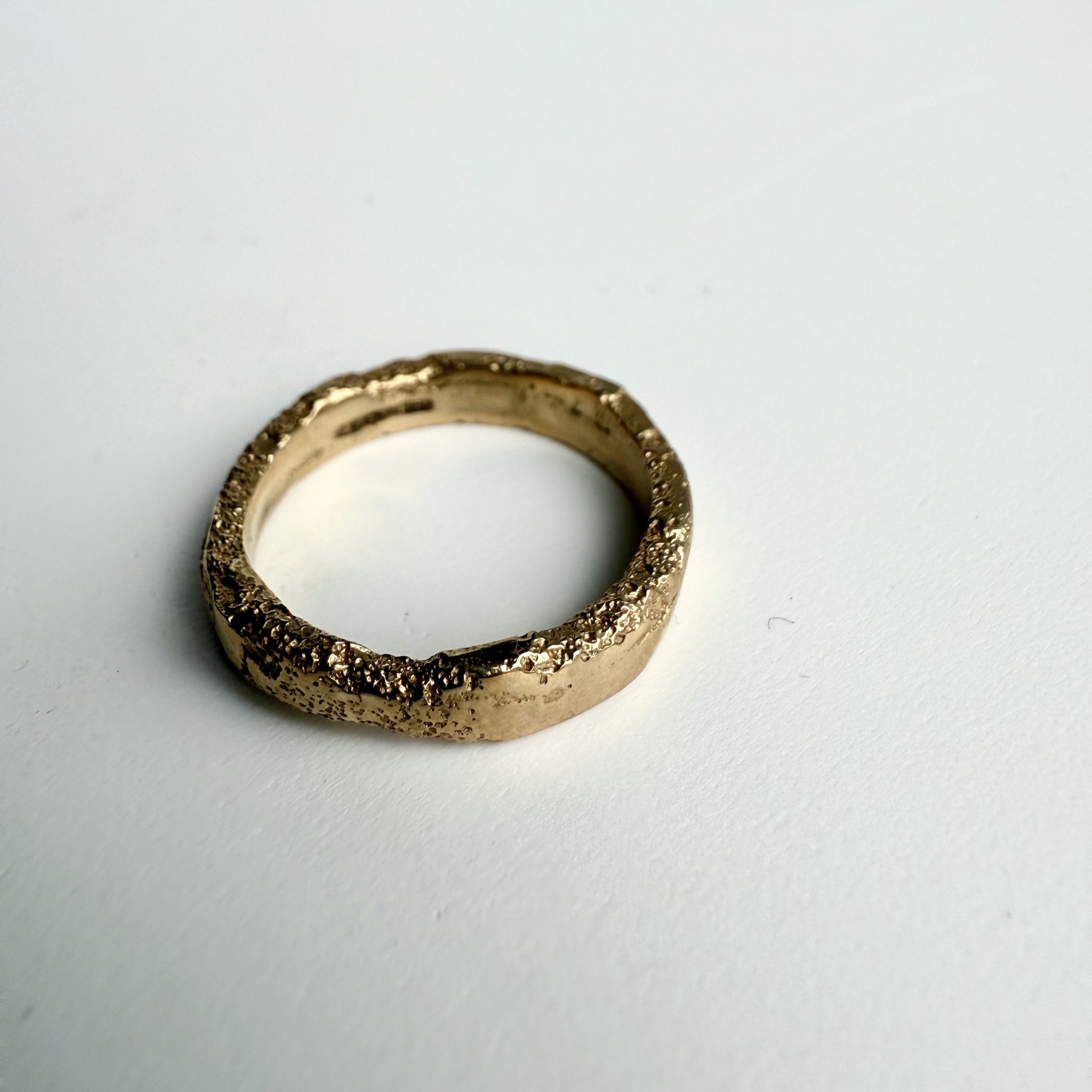 9ct gold ring band, sand cast with added medium for extra texture