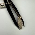 9ct gold sand cast marquise shaped pendant.